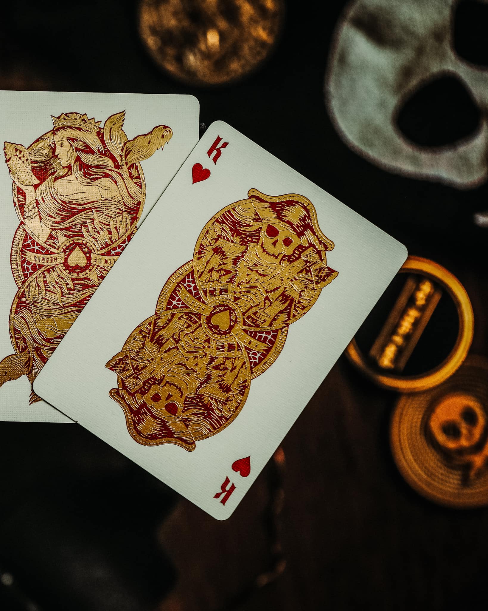 Premium Photo  A gold and black playing card with a gold ace of spades on  it.